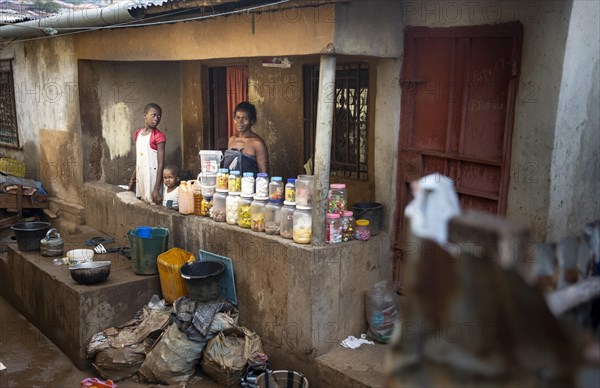 Shopkeeper at Bomeh Village on KissyRoad dumpsite