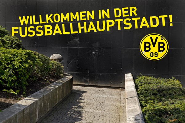 Welcome to the football capital is written on the wall of a BVB fan shop