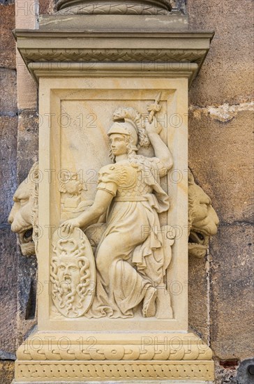 Freshly restored image of the goddess Pallas Athena as a stone relief on a column base at the outer portal of Hohentuebingen Palace