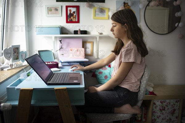 Subject: Girl at a desk