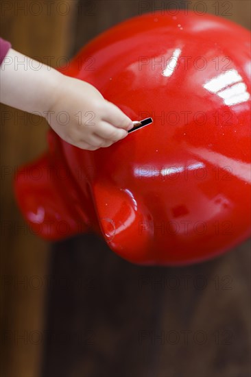 Child with piggy bank