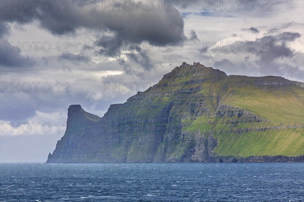 Sea cliffs along the rugged coast of Eysturoy