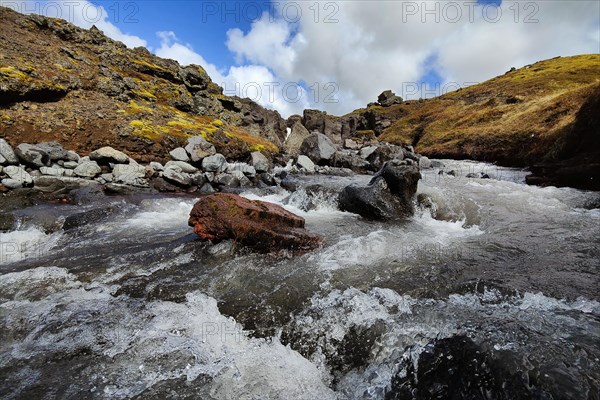 Fast-flowing river at Raudholl crater