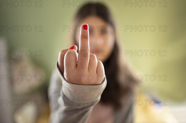 Topic: Girl shows middle finger in protest