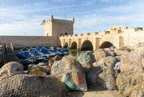 Blue wooden finish boats and nets