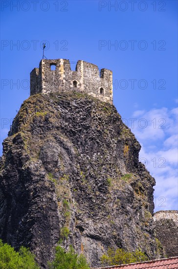 View of the remains of one of the twin towers of Trosky Castle in its picturesque rural setting in Rovensko pod Troskami