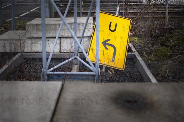 Traffic sign diversions lies on the ground