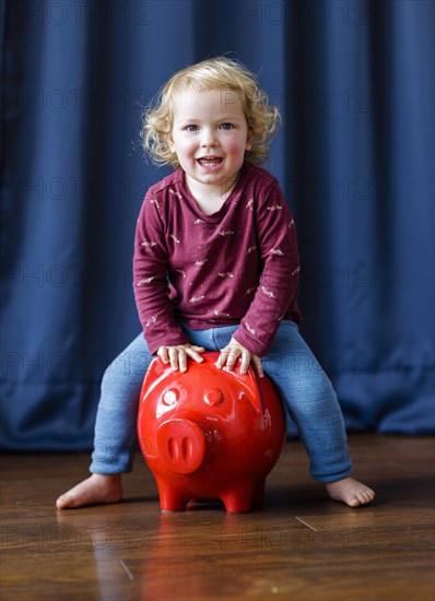 Child with piggy bank