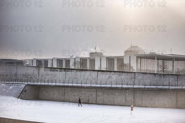 The Reichstag building stands out in the sunshine after heavy snowfall in the government district in Berlin