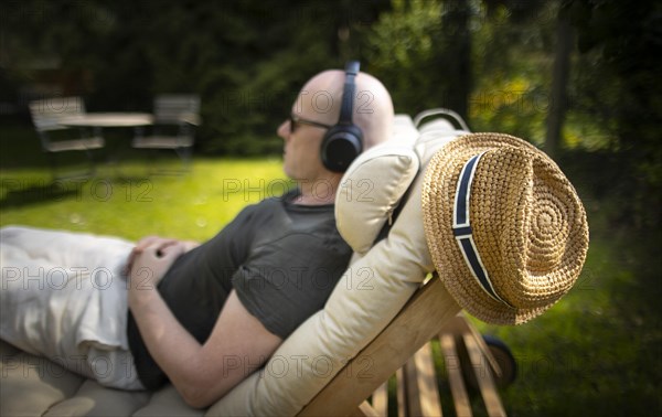 Subject: Relaxation on a lounger in the spring.