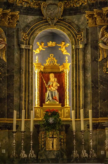 Altar with altarpiece of the Virgin Mary with the Child Jesus of the Baroque pilgrimage and parish church of St. Mary on the Rechberg near the district of the same name of Schwaebisch Gmuend