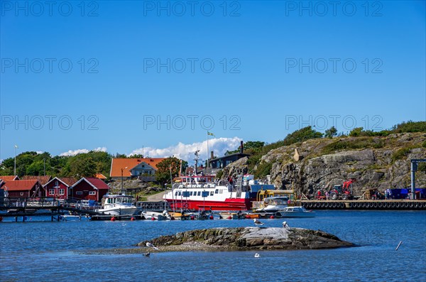 Ferry KOSTERFJORD against the backdrop of Nordkoster