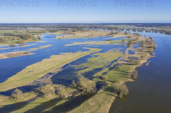 Aerial view over the river Elbe and flooded Lower Saxon Elbe Valley Biosphere Reserve in winter
