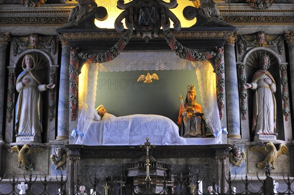 Interior of the chapel chapelle de la Vierge couchee with the sleeping Virgin Mary in bed