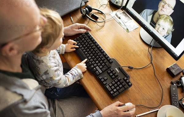 Hands on a keyboard.