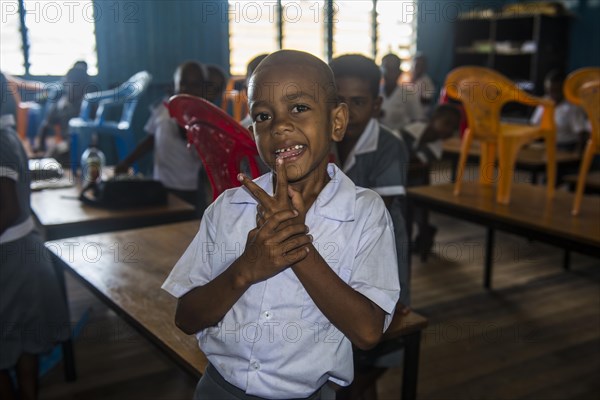 Very happy school children in a school