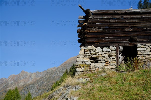 Old Broken Rustic House on the Mountain with Blue Sky in Ticino