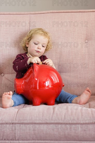 Child with piggy bank