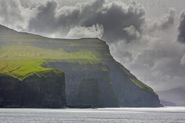 Sea cliffs along the rugged coast of Eysturoy