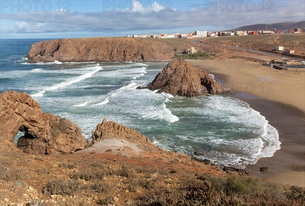 Beach rocky outrcop coastline in bay