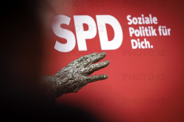 Making progress out of change. A discussion on the occasion of the 160th birthday of the SPD with the award of the August Bebel Prize to Franz Muentefering. Here: Detail of the Willy Brandt statue by Rainer Fetting in the SPD party headquarters in front of the lettering SPD Soziale Politik fuer Dich. Berlin