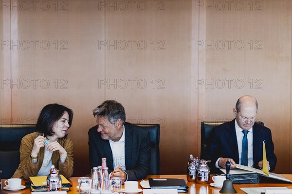 (R-L) Olaf Scholz (SPD), Federal Chancellor, Robert Habeck (Buendnis 90 Die Gruenen), Federal Minister for Economic Affairs and Climate Protection and Vice Chancellor, and Annalena Baerbock (Buendnis 90 Die Gruenen), Federal Minister for Foreign Affairs, taken during the weekly meeting of the Cabinet in Berlin, 24 May 2023, Berlin, Germany, Europe