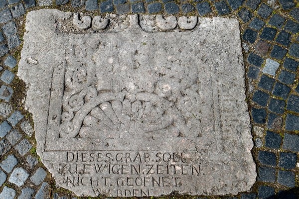 Historic gravestones in the pavement in front of St. Nicholas Church