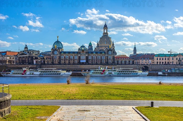 The historic old town scenery on the Terrassenufer seen from the Koenigsufer with a view of the steamer landing stage with paddle steamers