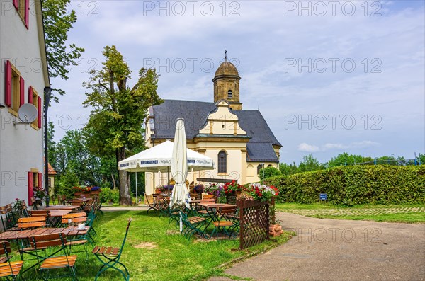Exterior view of the Baroque pilgrimage and parish church of St. Maria and beer garden of the Haus Rechberg restaurant on the Rechberg near the district of the same name in Schwaebisch Gmuend
