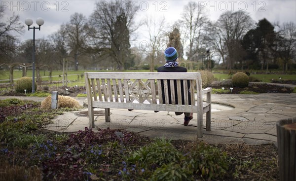 Subject: Pensioner on a park bench in Westfalenpark in Dortmund