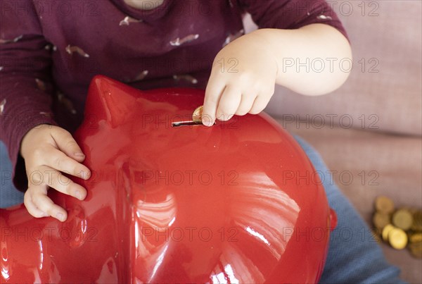 Child with piggy bank