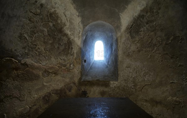 Light falls through plaster windows