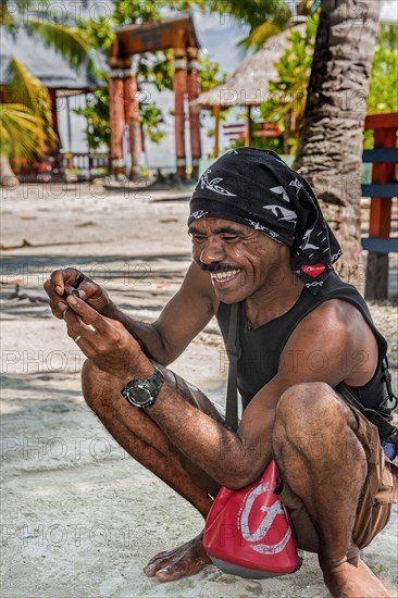 Divemaster from Papua-Diving on Arborek Island in the Dampier Strait