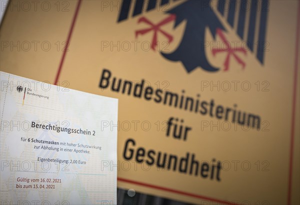 Certificate of entitlement for six FFP2 high protection masks to be collected from a pharmacy. Recorded in front of the Federal Ministry of Health in Berlin