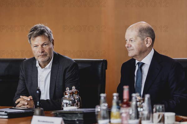 (R-L) Olaf Scholz (SPD), Federal Chancellor, and Robert Habeck (Buendnis 90 Die Gruenen), Federal Minister for Economic Affairs and Climate Protection and Vice Chancellor, recorded during the weekly meeting of the Cabinet in Berlin, 24.05.2023., Berlin, Germany, Europe