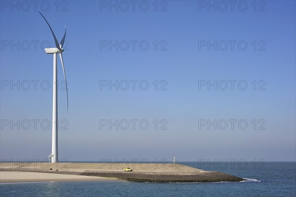 Wind turbine on dam