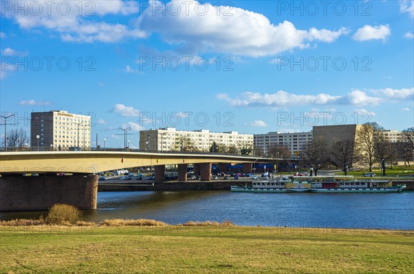 Modern buildings and synagogue as well as Elbe steamer seen from the Koenigsufer below the Carolabruecke