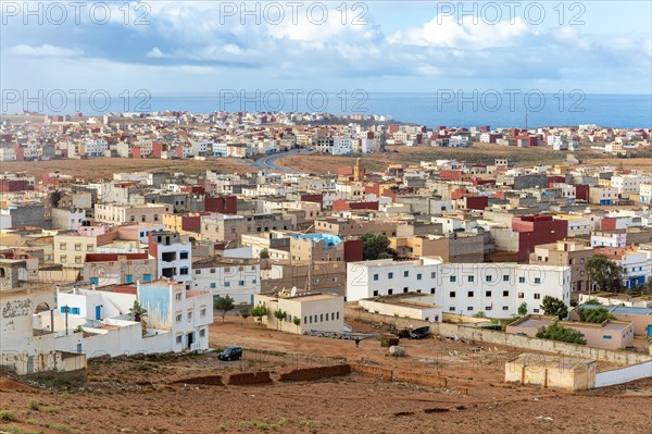 Oblique view over coastal town to Atlantic Ocean