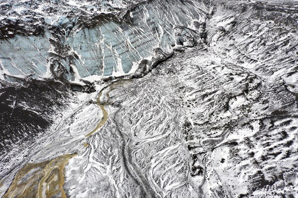 Aerial view over the glacial Virkisa River basin along the Glacier Falljoekull in winter in Austurland