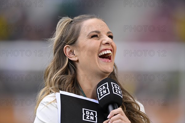 Presenter Laura Wontorra with microphone