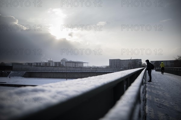 The Reichstag building stands out in the sunshine after heavy snowfall in the government district in Berlin
