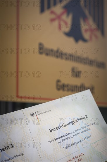 Certificate of entitlement for six FFP2 high protection masks to be collected from a pharmacy. Recorded in front of the Federal Ministry of Health in Berlin