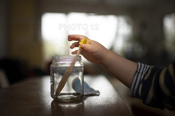 Topic: Poverty. Toddler and bitten toothbrush