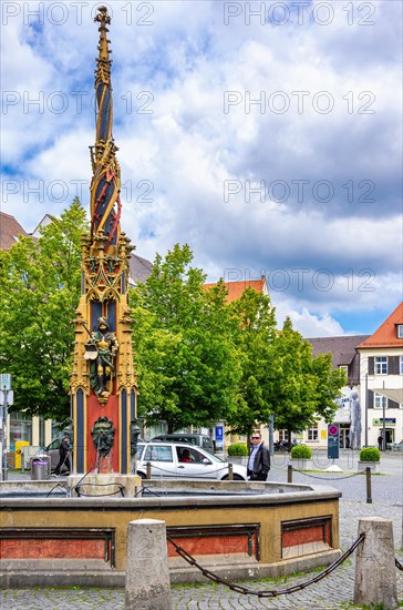 Street scene on the market square in front of the town hall with the so-called fish box or Syrlin fountain in the centre