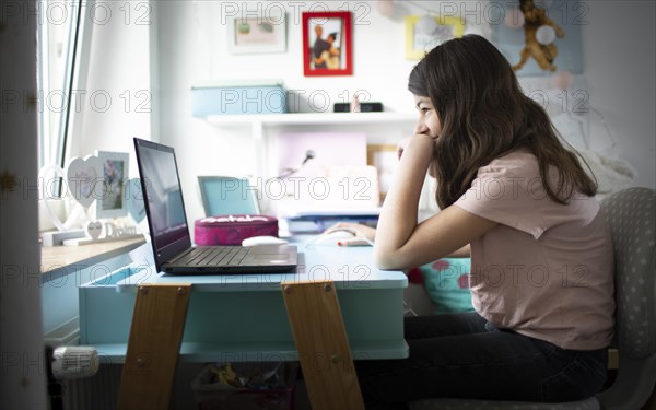 Subject: Girl at a desk