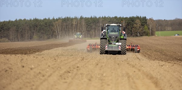 Soil cultivation for maize sowing with tractor Fendt 1050