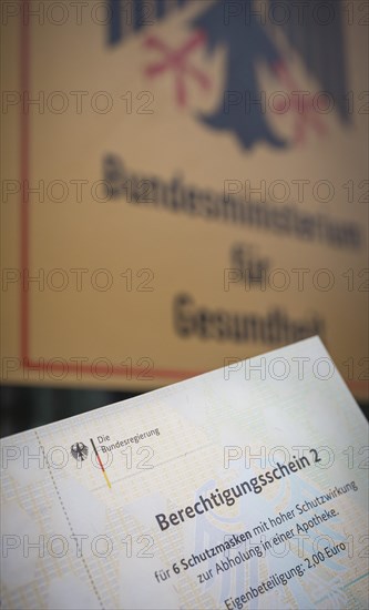 Certificate of entitlement for six FFP2 high protection masks to be collected from a pharmacy. Recorded in front of the Federal Ministry of Health in Berlin