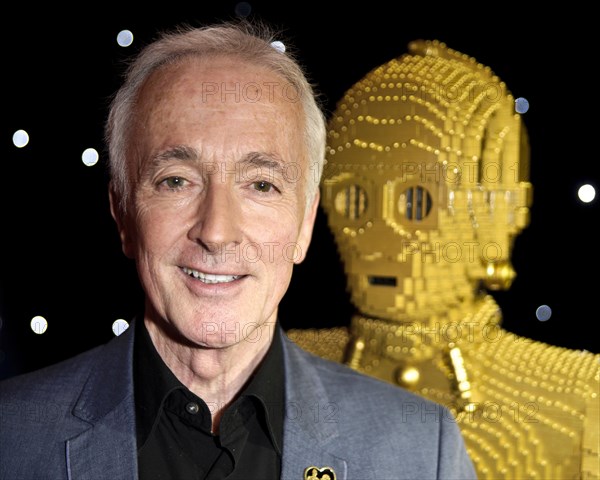 Anthony Daniels who played C3PO in all 6 Star Wars Movies with a Lego model of his character at Star Wars Episode 1 3D at The Empire