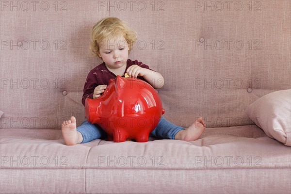 Child with piggy bank