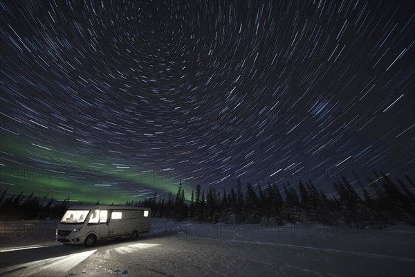 Camping with a camper van under star trails in Pallas Yllaestunturi National Park